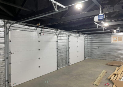 A garage with two metal doors in it.
