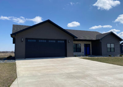 A home with a garage and a driveway.