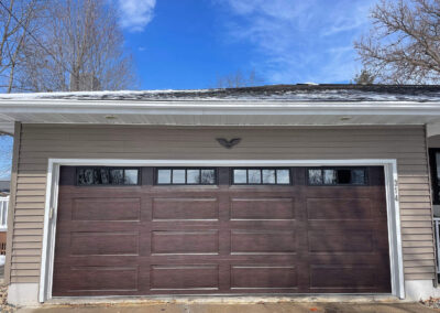 A home with a brown garage door.